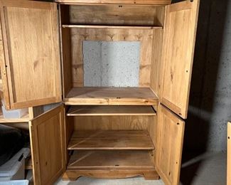 COUNTRY PINE MEDIA CABINET | Pine wood entertainment center / TV cabinet, top and bottom sections with double cabinet doors, the top section with space for a television and cutout back for cabling, the bottom half for storage, A/V equipment, etc.; h. 71 x 37-1/2 x 21 in.