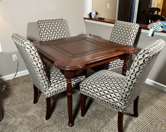 SARRIED LTD. CARD TABLE | Dark wood finish with leather playing surface, includes set of 4 Sam Moore dining chairs with fabric upholstery and old world shaker legs; table h. 30-1/2 x 43-1/4 in. chair h. 39-1/2