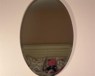 OVAL WALL MIRROR | Ovalular wall mirror with beveled glass, unframed; 36 x 24 in.