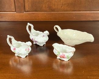 (4pc) CHINA TABLE ITEMS | All bone china with gilt accents; largest by Lenox (l. 8 in.); plus three matching Autumn Glory floral pieces by Hammersley including two creamers or gravy boats and a small footed dish