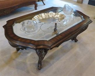 Glass top coffee table.  Measurements:  60" x 35" x 20 high