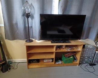 another TV, TV stand, cool lamp, storage drawers for garage