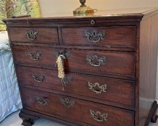 Spectacular 18th century five drawer chest with brushing shelf