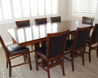 Casual dining set with 8 chair and a matching bench