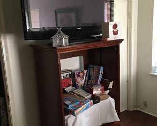 Entertainment center, television, games