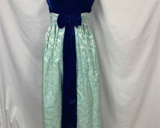 Vintage handmade dress. Shoulder to shoulder 14 inches. Shoulder to waist 14 inches. Shoulder to hem 53 inches. Waist 24 inches. Waist to hem 38 inches. Chest 32-33 inches. $40 shipping included.