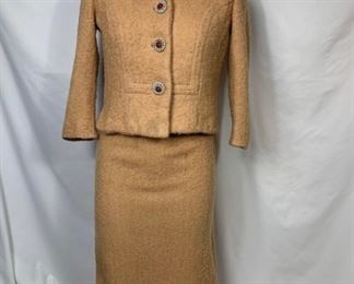 Jacket/Skirt Suit Set. Jacket shoulder to shoulder 14 inches. Shoulder to hem 16.5 inches. Chest 36-37 inches. Skirt waist 23 inches. Waist to hem 25.5 inches. Hips 34 inches. $50 shipping included.
