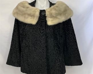 Cropped vintage coat with fur collar. Shoulder to shoulder 17 inches. Shoulder to hem 25 inches. 3/4 sleeves measure 20 inches. $50 shipping included.