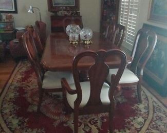Dining Room Table, Eight Chairs Rug