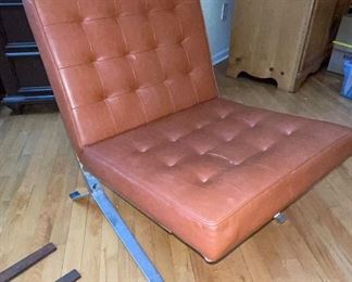 Vintage Barcelona style chair  w/ chrome plated legs & tufted vinyl covering.