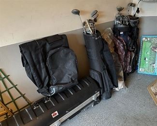3 Sets of golf clubs w/ bags