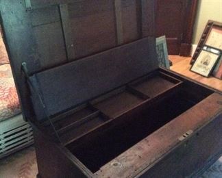Carpenter’s chest open. Many compartments and sliding drawers