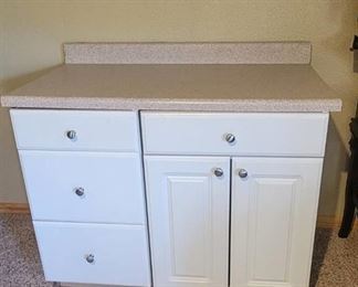 2 Separate Cabinets with Countertop - 42" x 24" x 34.5" in Basement
