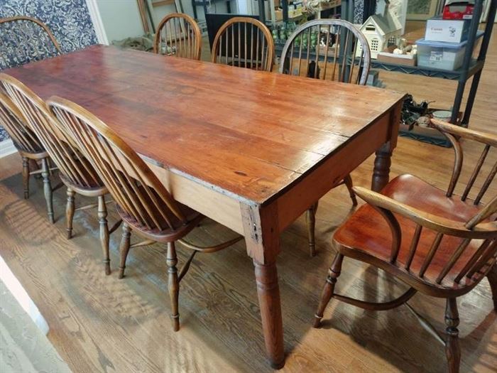 Civil War era solid wood dining table 30 x 96 x 36 in with 6 spindle back oak and 2 spindle back armed dining chairs