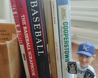 KC Royals bobblehead with various baseball books