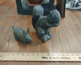 Cement squirrel and cast iron bunny