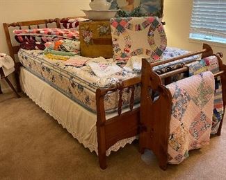 Full maple bed with mattress and box/lots of antique quilts