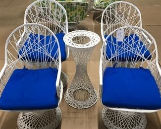 Mid century fiberglass set of 4 chairs with cushions, comes with plant stand sold as a set.