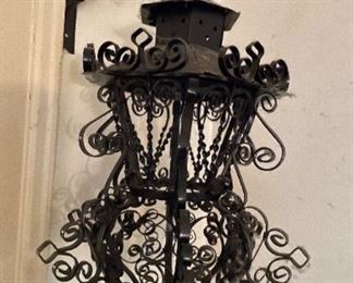 Intricate wire work sconce with bracket.
