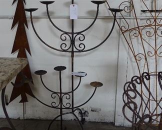 Large candle holders and pair of metal trees.