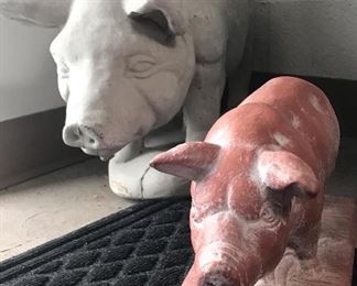 Heavy Cement Pig, and baby pig in a terra-cotta stain. This is the perfect pair, they are clean, don't eat much, just looking for a new home.