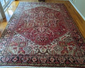 Vintage hand-woven Persian Heriz rug, measures 8' 2" x 12' 4".