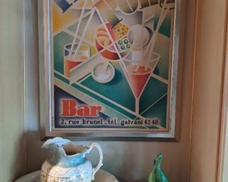 Beautifully framed original European art poster "Ping Pong Bar", antique wash basin/pitcher and vintage Camark #160 art pottery large green bowl, w/leaves, berries and intertwined cranes flower center.