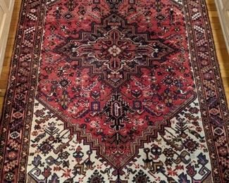 Lovely hand-woven Persian Heriz rug, measuring 4' 7" x 6' 8".