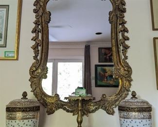 Nicely detailed wall mirror, w/eagle topper, pair of porcelain jars on brass stands, vintage wooden box and brass mercantile store display stand.