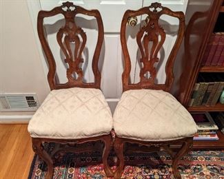 Two of a set of six Vintage French walnut side chairs, with nicely upholstered seats.