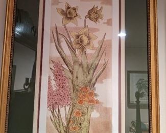 One of a pair of nicely framed/matted artist signed/numbered floral lithographs.