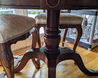 Nice brass lion head detail and study base on the 1940's mahogany drum table.