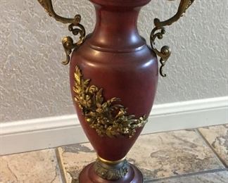very large ornate vase that was traditionally placed on hearth