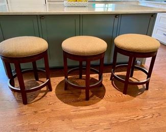 Three swivel counter stools                                                 25.5"h x 20" diameter