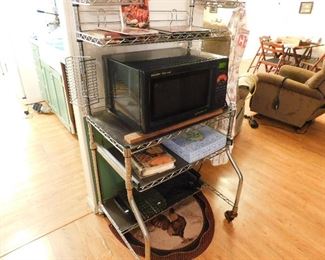 microwave, stainless shelving