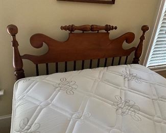 Very nice three-quarter bed with like new mattress set .