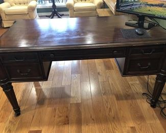 Ethan Allen Executive Desk Mahagonny color with a green  high back leather chair (not shown) Desk and Chair 800.00 (58" W x 30"D x 32" H 