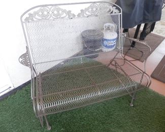 Nice love seat size wroght iron and steel "GLIDER / rocker"......great for inside or out....want it?  Give me a call  DJ  (760) 975-5483