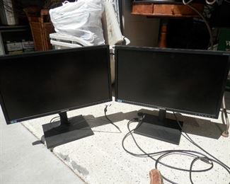 2 matching SAMSUNG  23 inch HDMI computer monitors.....The screens rotate 90 degrees for document reading. 