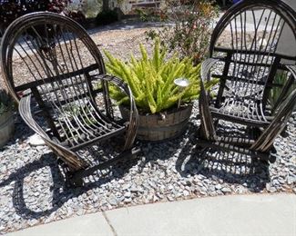 The pairof bent willow chairs...one is a rocker and one is a stationary chair