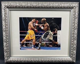 Please note: COA is from a lesser known 3rd party not widely recognized by the sports card hobby.  Please use your own judgment and research as we cannot guarantee authenticity of items with COA's by companies other than PSA/JSA/AAU Floyd Mayweather Autographed Photo w/ COA