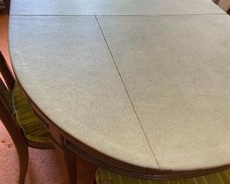 Triune by Drexel dining table with custom-made protective cover