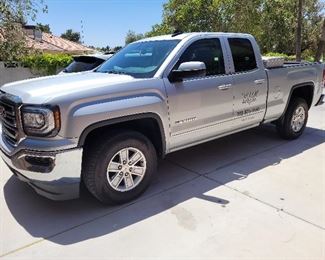2016 GMC sierra quad cab Pick up truck with 64,629 miles. Passenger side damage (pictured) - $31,000 or best offer