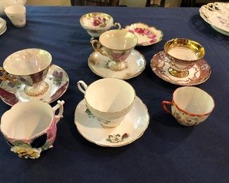 VINTAGE CUPS AND SAUCERS.