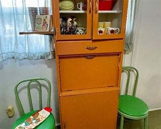 Fun orange drop front small kitchen cabinet