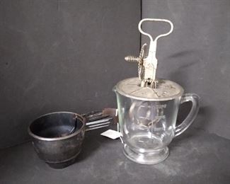 vintage measuring cup with mixer lid and vintage sifter