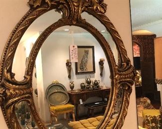 Large metal ornate designer mirror