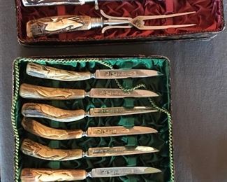An unbelievable set of bone handle steak and carving knives. Incredible ornate handle designs. Simply beautiful.