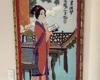 "Poetess" Original needlepoint tapestry. Image: 38 1/4" h x 22 5/8" w; frame: 42" h x 27" w in a red silk mat, surrounded by raised, hand-carved gilded bamboo. Text in Japanese caligraphy explains that- "She reads and waits for her lover, who (unknown to her has died." $2,500
