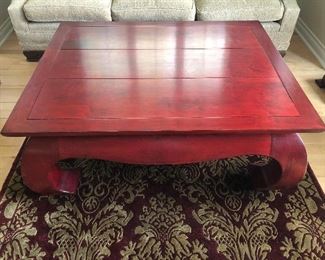 Beautiful red Bombay-style coffee table 38.5"deep x 48.5" wide x 20" tall. $500